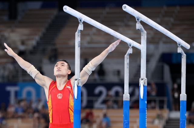 开云体育-邹敬园双杠决战无敌夺冠 体操队巴黎争金还看他?